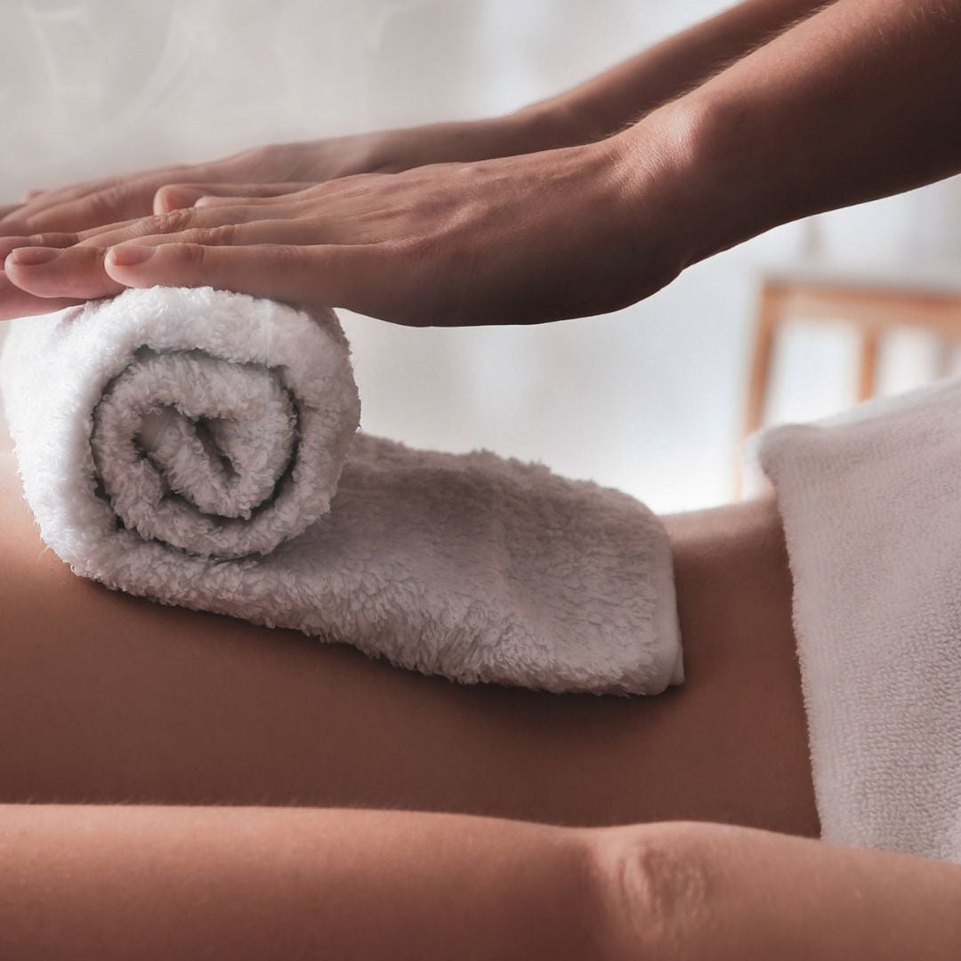 Massagem com toalhas quentes